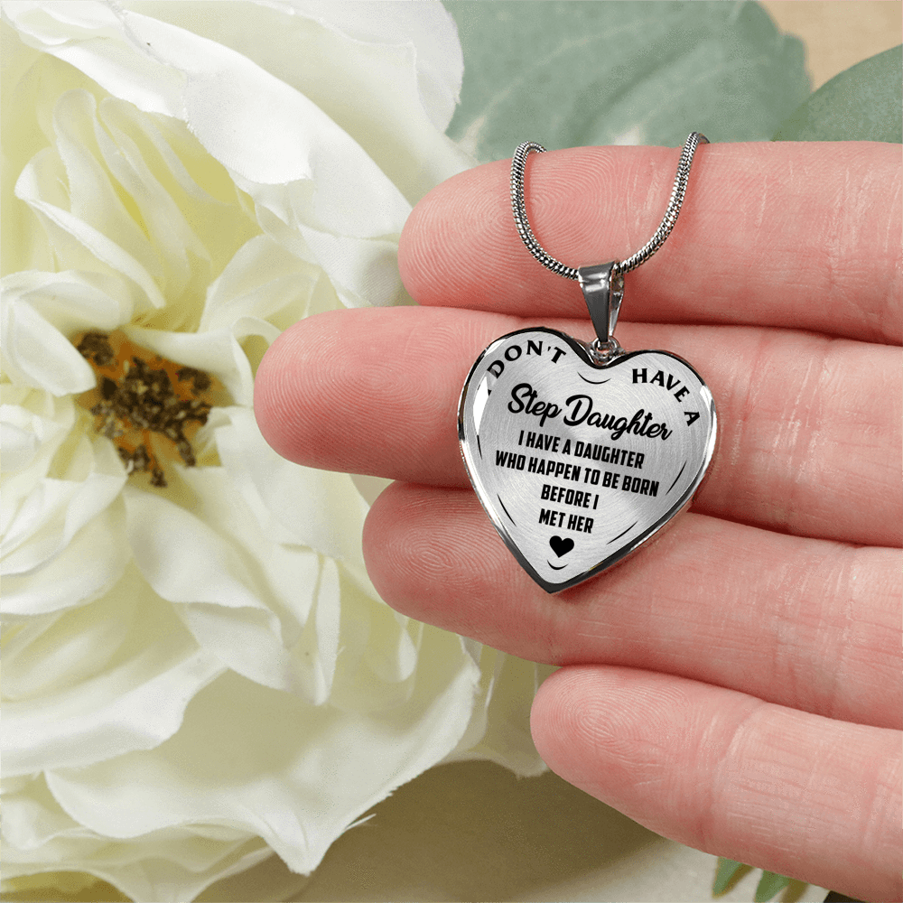 I DON'T HAVE A STEPDAUGHTER, BORN BEFORE I MET HER, SILVER OR GOLD FINISHED HEART SHAPED NECKLACE (BLACK ON TRANSPARENT) - podprintz.com