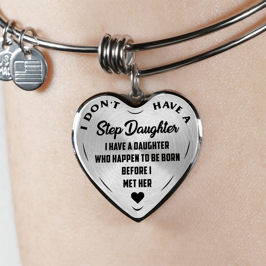 I DON'T HAVE A STEPDAUGHTER, BORN BEFORE I MET HER, SILVER OR GOLD FINISHED HEART SHAPED BANGLE BRACELET (BLACK ON TRANSPARENT) - podprintz.com