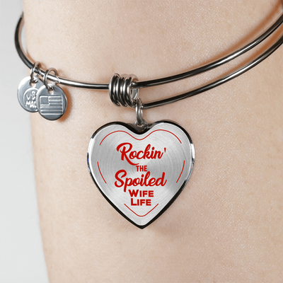 ROCKIN' THE SPOILED, WIFE LIFE - SILVER AND GOLD FINISHED HEART SHAPED BANGLE BRACELET (RED TEXT ON TRANSPARENT) - podprintz.com