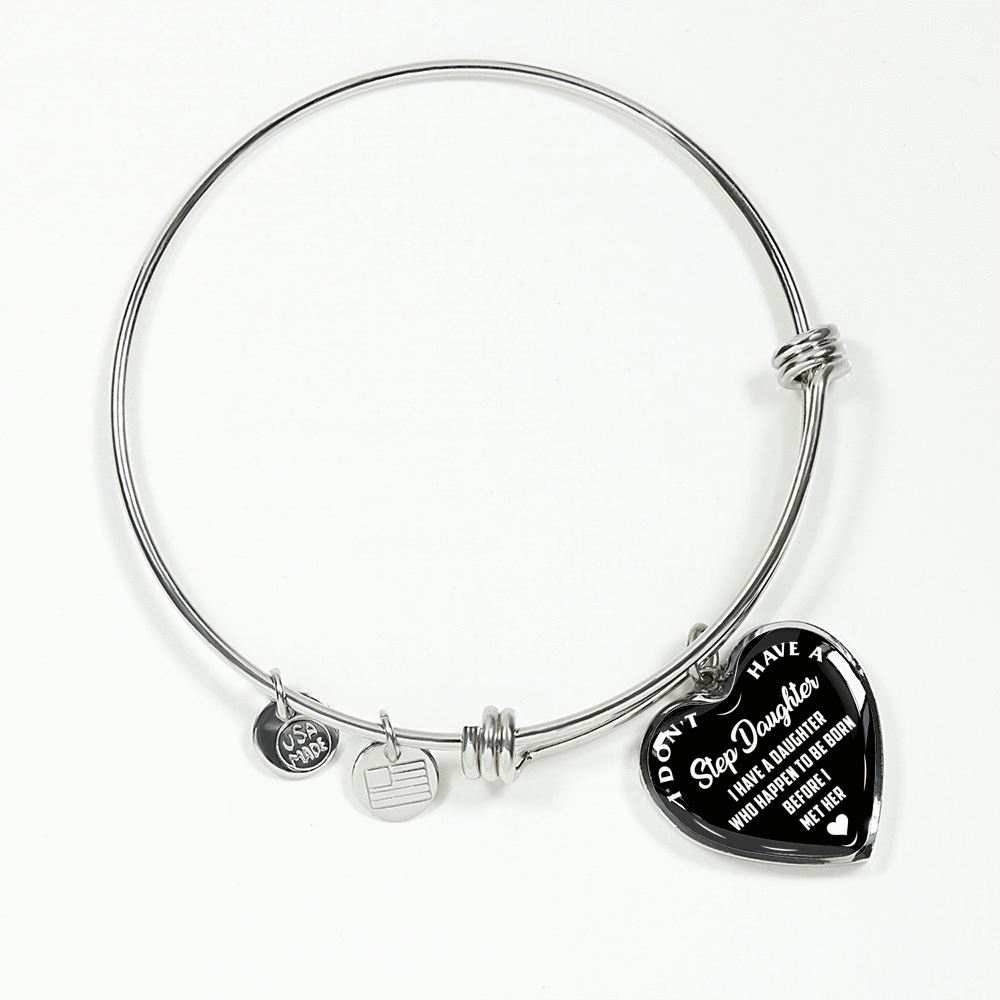 I DON'T HAVE A STEPDAUGHTER, BORN BEFORE I MET HER, SILVER OR GOLD FINISHED HEART SHAPED BANGLE BRACELET (WHITE ON BLACK) - podprintz.com