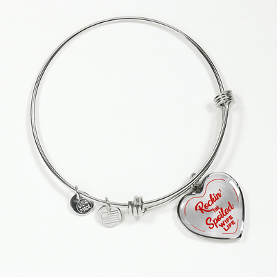 ROCKIN' THE SPOILED, WIFE LIFE - SILVER AND GOLD FINISHED HEART SHAPED BANGLE BRACELET (RED TEXT ON TRANSPARENT) - podprintz.com