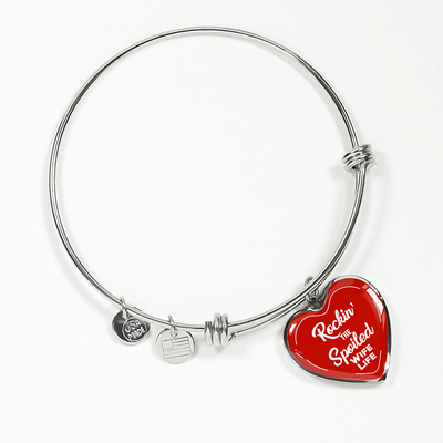 ROCKIN' THE SPOILED, WIFE LIFE - SILVER AND GOLD FINISHED HEART SHAPED BANGLE BRACELET (WHITE TEXT ON RED) - podprintz.com