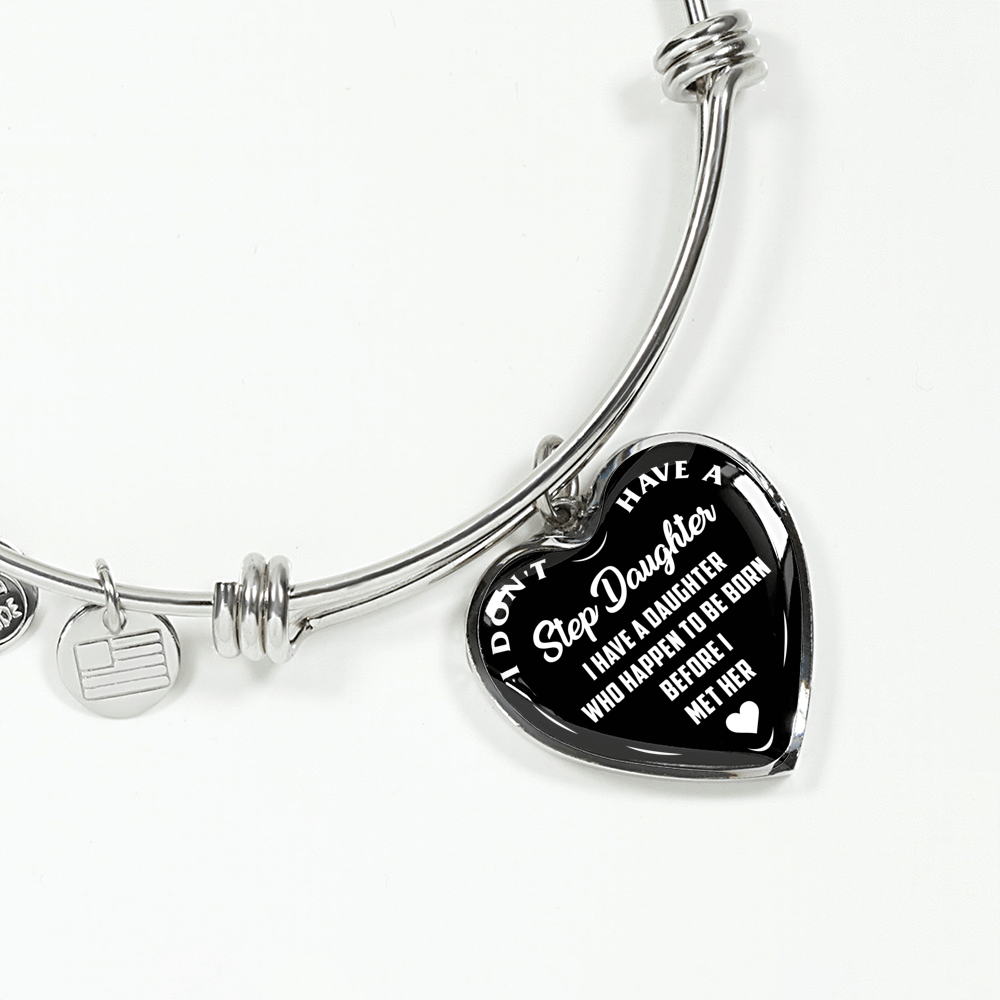 I DON'T HAVE A STEPDAUGHTER, BORN BEFORE I MET HER, SILVER OR GOLD FINISHED HEART SHAPED BANGLE BRACELET (WHITE ON BLACK) - podprintz.com