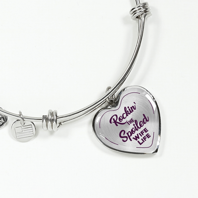 ROCKIN' THE SPOILED, WIFE LIFE - SILVER AND GOLD FINISHED HEART SHAPED BANGLE BRACELET (PURPLE TEXT ON TRANSPARENT) - podprintz.com