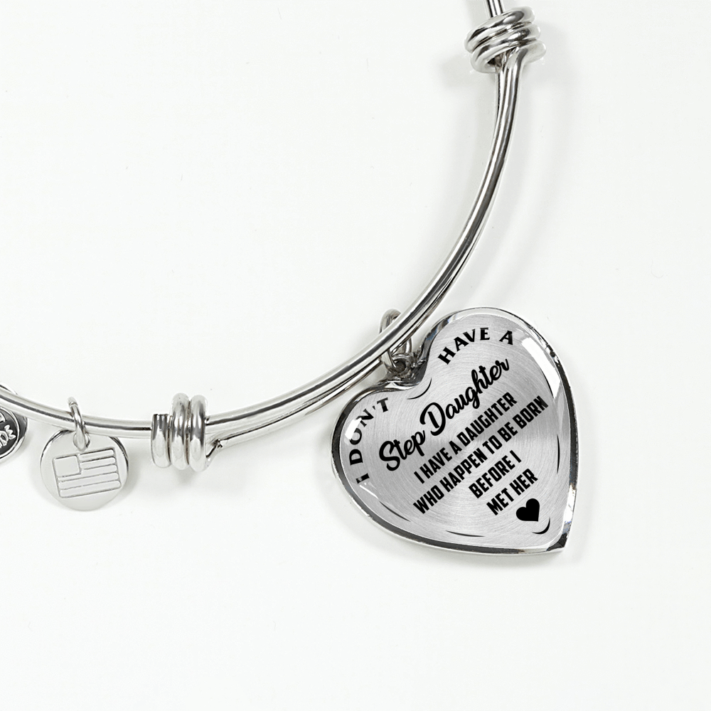 I DON'T HAVE A STEPDAUGHTER, BORN BEFORE I MET HER, SILVER OR GOLD FINISHED HEART SHAPED BANGLE BRACELET (BLACK ON TRANSPARENT) - podprintz.com