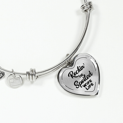 ROCKIN' THE SPOILED, WIFE LIFE - SILVER AND GOLD FINISHED HEART SHAPED BANGLE BRACELET (BLACK TEXT ON TRANSPARENT) - podprintz.com