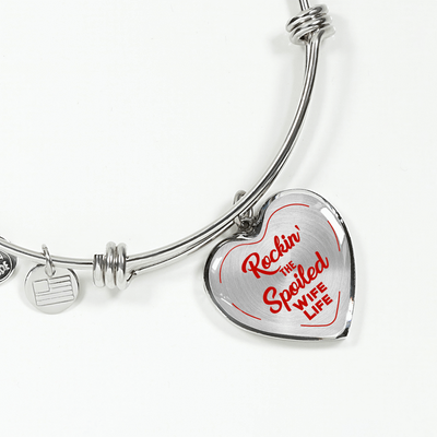 ROCKIN' THE SPOILED, WIFE LIFE - SILVER AND GOLD FINISHED HEART SHAPED BANGLE BRACELET (RED TEXT ON TRANSPARENT) - podprintz.com