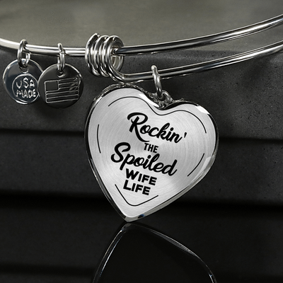 ROCKIN' THE SPOILED, WIFE LIFE - SILVER AND GOLD FINISHED HEART SHAPED BANGLE BRACELET (BLACK TEXT ON TRANSPARENT) - podprintz.com