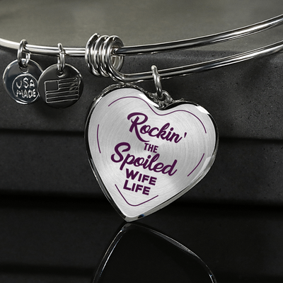 ROCKIN' THE SPOILED, WIFE LIFE - SILVER AND GOLD FINISHED HEART SHAPED BANGLE BRACELET (PURPLE TEXT ON TRANSPARENT) - podprintz.com