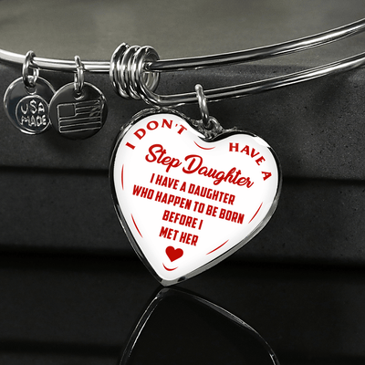 I DON'T HAVE A STEPDAUGHTER, BORN BEFORE I MET HER, SILVER OR GOLD FINISHED HEART SHAPED BANGLE BRACELET (RED ON WHITE) - podprintz.com
